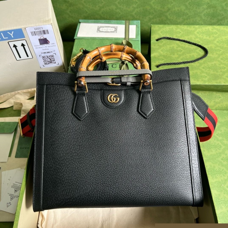 G*u*i top handle bags